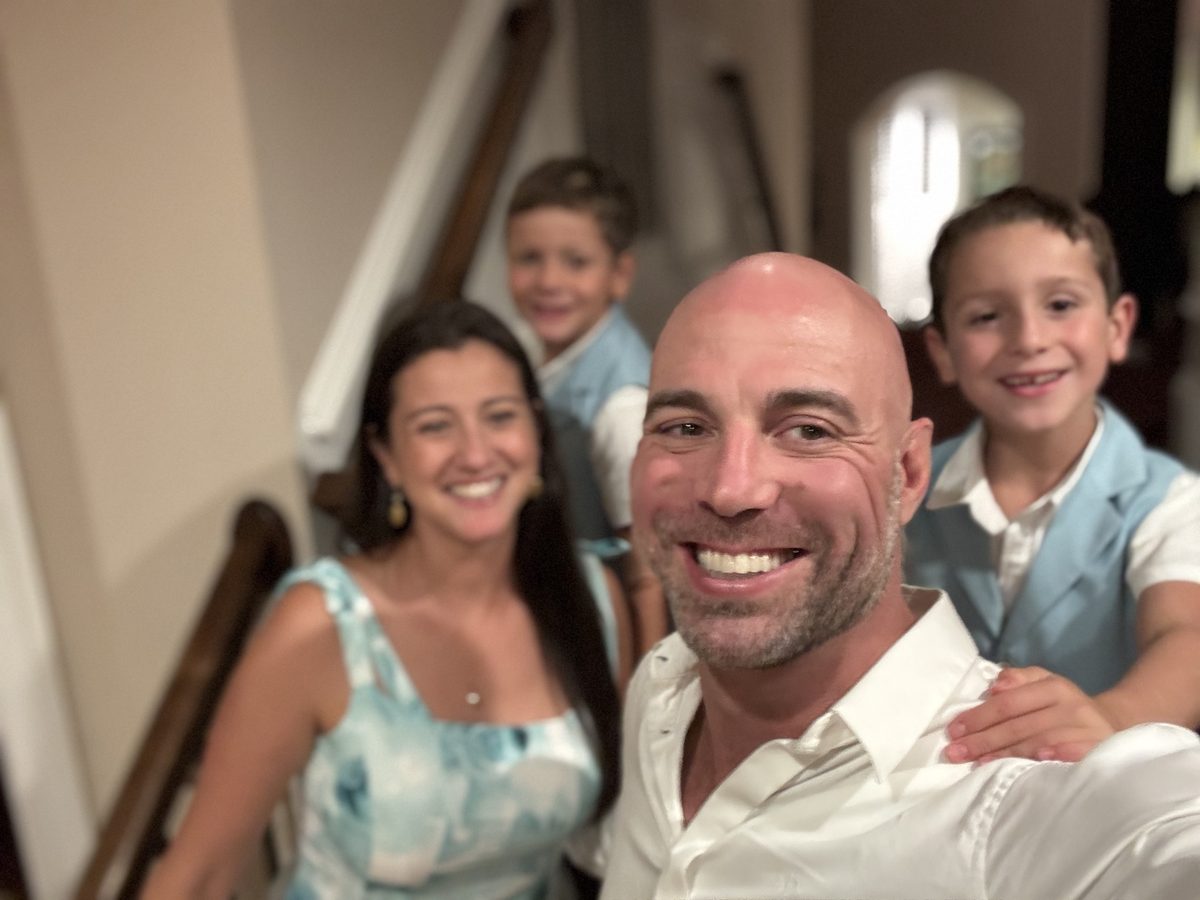 Brent Lillard taking a selfie with his wife Jessica and their two sons